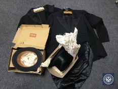 Three vintage black gent's formal suits together with three top hats and two vintage corsets