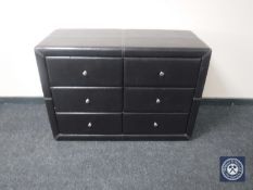 A contemporary leather four drawer chest