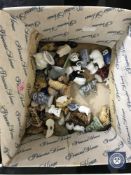 A box of Wade whimsies and similar figures