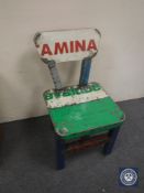 An oil drum dining chair