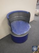 An oil drum tub chair