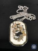 A Japanese Satsuma earthenware pendant mounted in white metal CONDITION REPORT: The