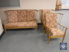 A wood framed lounge suite