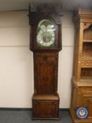 An early 19th century mahogany eight day longcase clock with painted rolling moonphase dial signed