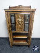 A Victorian inlaid rosewood music cabinet