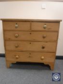 A Victorian pine five drawer chest