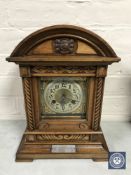 A mahogany cased Junghans presentation bracket clock with brass dial,