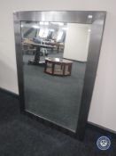 A silvered framed overmantel mirror