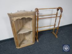 A set of pine hanging corner shelves together with a pine towel rail