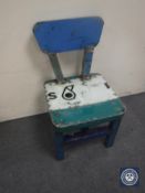 An oil drum dining chair