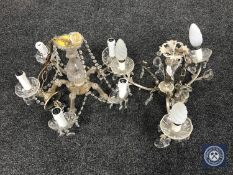 A five branch chandelier with glass drops and a three branch chandelier with glass drops