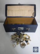 A jewellery box containing a collection of costume jewellery