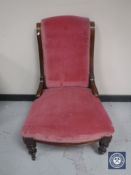 A Victorian mahogany lady's chair upholstered in pink Dralon
