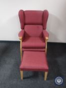 A beech framed wingback armchair and matching footstool
