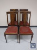 A set of four mahogany dining chairs