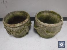 A pair of classical stone garden planters