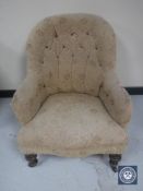 A Victorian buttoned back lady's chair upholstered in brocade fabric