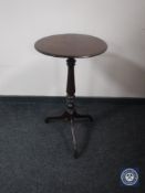 A Victorian mahogany wine table on tripod pedestal