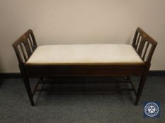 An Edwardian inlaid mahogany duet stool, width 105 cm.