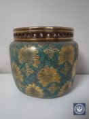 A Royal Doulton Lambeth gilded planter, height 16.
