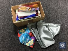 A box of sixteen silk scarves