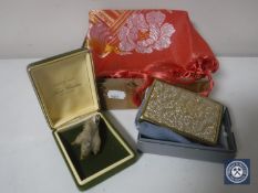 A box of hand-stitched scarf,