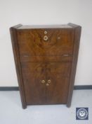 A walnut Art Deco cocktail cabinet CONDITION REPORT: 120cm high by 77cm wide by 41cm