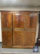 A Victorian mahogany triple door wardrobe with fitted interior, width 191 cm.