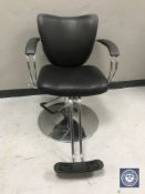 A gas lift hair dresser's chair