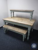 A reclaimed pine farmhouse pine kitchen table with painted base together with two matching benches