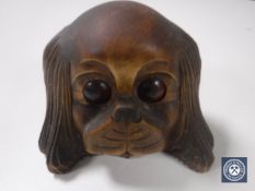 A novelty desk timepiece in the form of a dog with revolving eyes CONDITION REPORT: