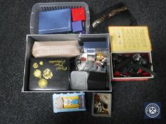 A basket containing a quantity of assorted costume jewellery and watches