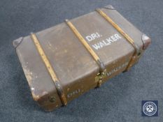An early 20th century wooden bound trunk