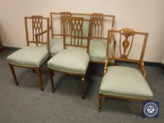 An Edwardian four-piece salon suite comprising of two seater settee,