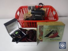 A box of cased Nikon SG20 camera with lens, vintage Philips shaver, darts,