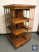 An Edwardian mahogany revolving book stand, height 115 cm.
