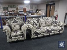 A contemporary scroll arm settee and armchair in brocade and five scatter cushions