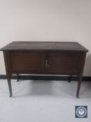 A Victorian mahogany three-tier folding cake stand and a mahogany wash stand