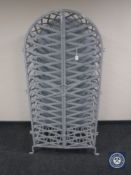 A metal dome-topped forty bottle wine store