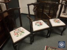 A set of eight late Victorian mahogany dining chairs with tapestry seats.