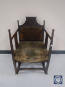 An Arts and Crafts mahogany armchair, probably William Birch for Liberty & Co,
