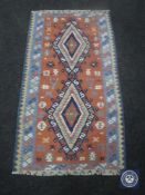 A kilim rug,