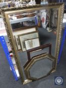 A gilt framed overmantel mirror,
