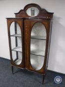 A Victorian inlaid mahogany display cabinet with mirror above