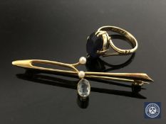An aquamarine and seed pearl bar brooch,