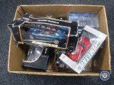 A box of seven boxed die cast cars - 1:18 scale Maisto Jaguar and Porsche etc