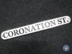 A cast metal plaque - Coronation Street