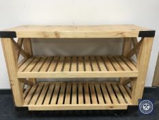 A pine three tier trolley