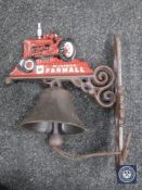 A cast metal door bracket with bell 