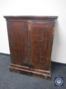 A Victorian pine double door cupboard